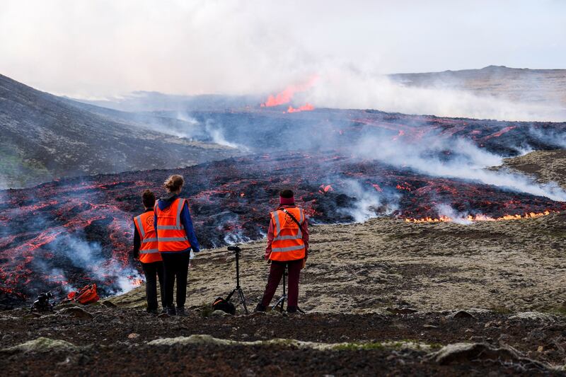 University of Iceland observers watch the volcanic eruption