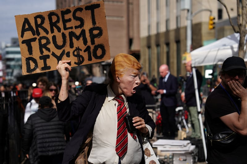 A protester dressed as the former president outside the Manhattan Criminal Courthouse. Reuters