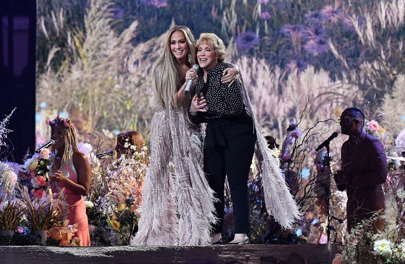 US singer Jennifer Lopez performs onstage with her mother Guadalupe Rodriguez. AFP