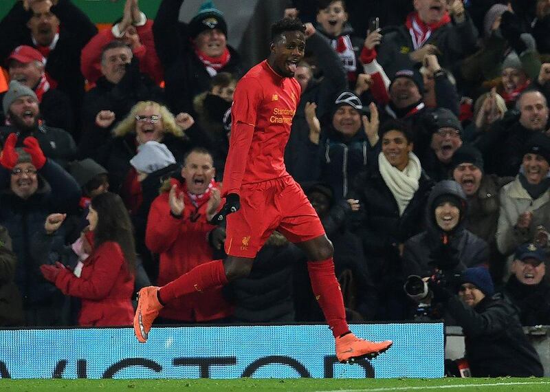 Liverpool’s Divock Origi celebrates scoring his team’s first goal. Paul Ellis / AFP