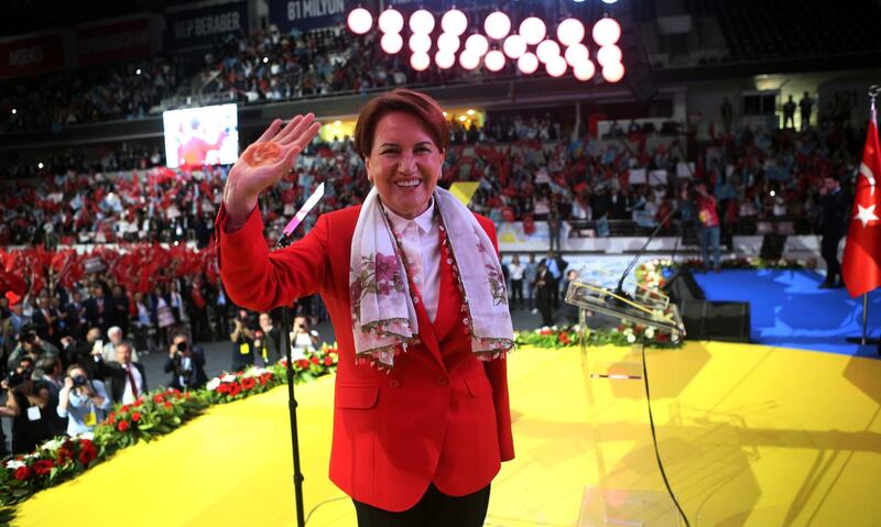 Meral Aksener, leader and presidential candidate of the Turkish opposition 'Good Party' (IYI) greets people during an election campaign meeting in Ankara, on May 30, 2018.   Turkey to hold snap elections on 24 June. / AFP / ADEM ALTAN
