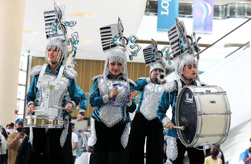 The band in all their finery before the start of the Dubai World Cup. Pawan Singh / The National