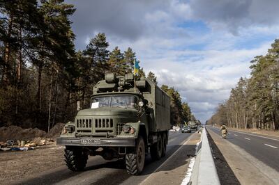 A Ukrainian military vehicle on a road near in Kyiv. There are concerns Russia might strike at lorry convoys carrying weapons from Nato territory into Ukraine. Getty Images