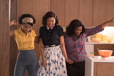 A handout movie still of Mary Jackson (Janelle Monae, left), Katherine Johnson (Taraji P. Henson) and Dorothy Vaughan (Octavia Spencer) celebrate their stunning achievements in one of the greatest operations in history in Hidden Figures (Hopper Stone / Twentieth Century Fox) *** Local Caption ***  on21se-movies-hidden.jpg