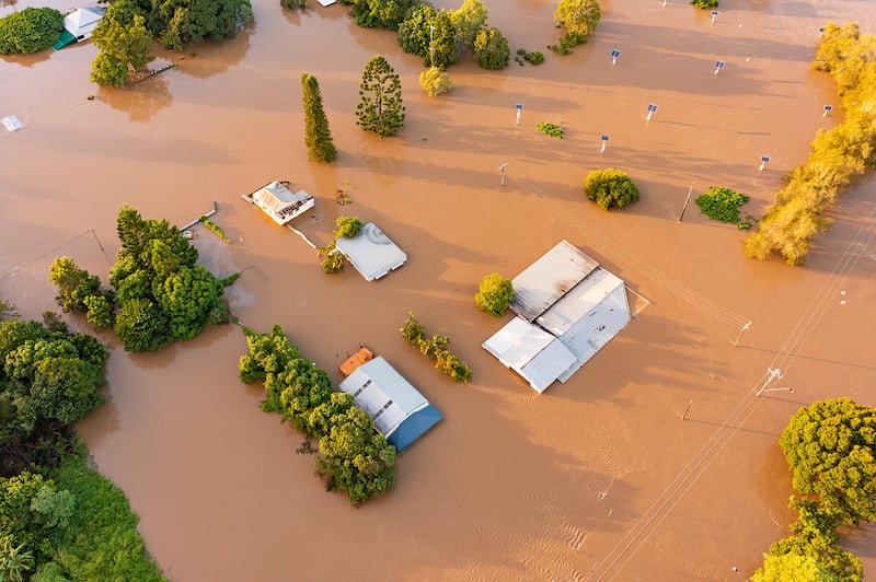 Water floods streets and houses in Maryborough, Australia. Heavy rain is bringing record flooding to some east coast areas while the flooding in Brisbane is the worst since 2011. AP