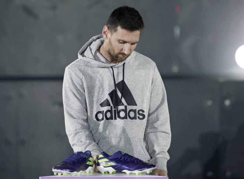 Lionel Messi reacts during the launch of his new boots at the Fira Barcelona. EPA