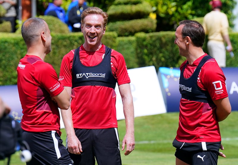 Actor Damian Lewis, centre, with Mark Noble and Joe Cole during a training session ahead of Soccer Aid at Champneys Tring, Wigginton. PA