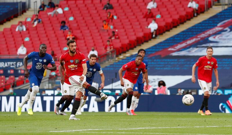 Bruno Fernandes scores a late consolation from the penalty spot for Manchester United. Reuters