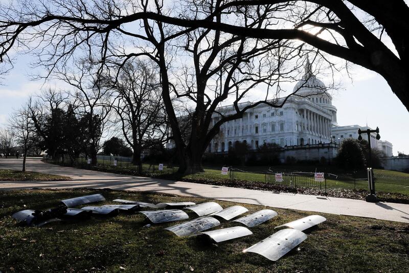 U.S. National Guard riot shields are laid out at the ready outside the U.S. Capitol Building on Capitol Hill in Washington, U.S.  REUTERS