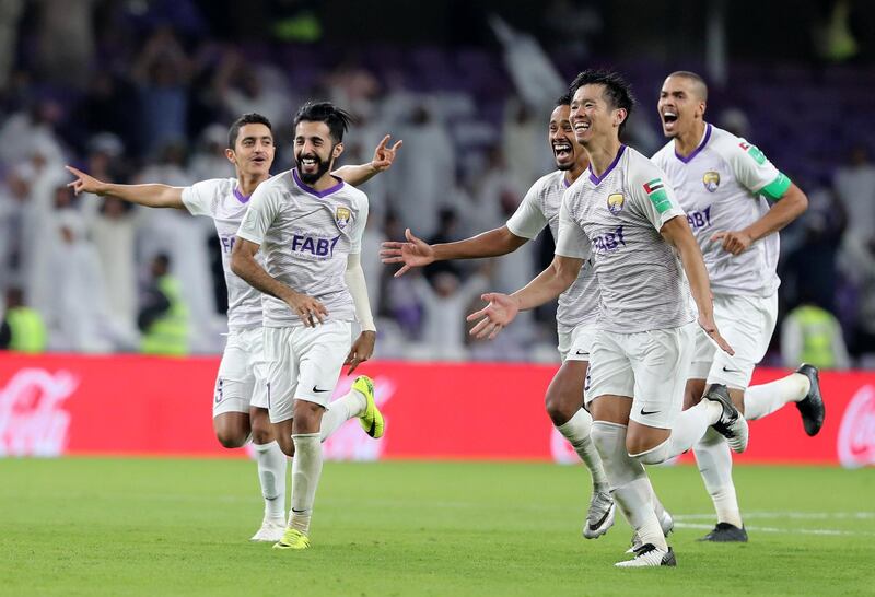 Al Ain, United Arab Emirates - December 12, 2018: Al Ain celebrate winning on penalties 4-3 after the game between Al Ain and Team Wellington in the Fifa Club World Cup. Wednesday the 12th of December 2018 at the Hazza Bin Zayed Stadium, Al Ain. Chris Whiteoak / The National