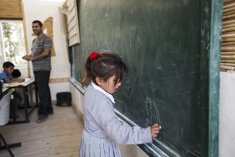A pupil takes part in a classroom activity.
