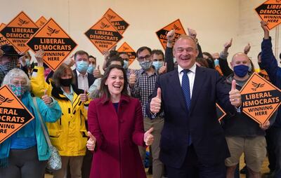 Liberal Democrat leader Ed Davey and new Liberal Democrat MP for Chesham and Amersham Sarah Green during a victory rally at Chesham Youth Centre in Chesham, England, Friday June 18, 2021, after Sarah Green won the Chesham and Amersham by-election. In a surprising result, Prime Minister Boris Johnsonâ€™s Conservative Party was easily defeated in a special election for a seat it has held onto for decades. (Steve Parsons/PA via AP)