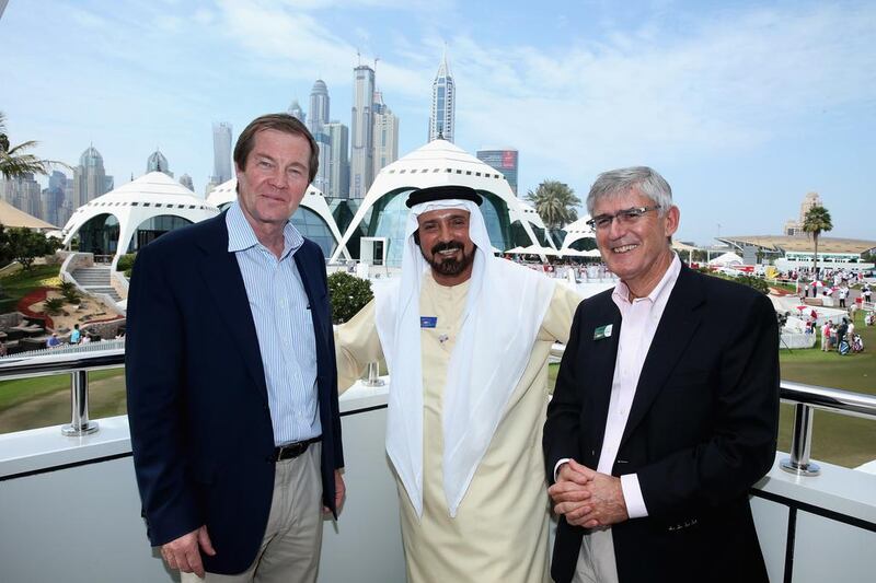 File picture of Mohamed Juma Buamaim, centre, with European Tour officials, chief executive George O’Grady, left, and board of directors chairman David Williams, in Dubai. Warren Little / Getty Images