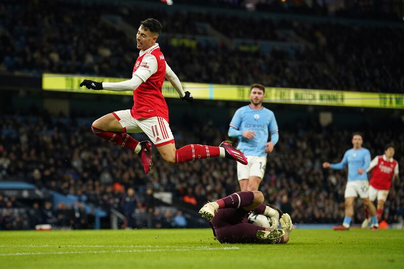 Manchester City's goalkeeper Stefan Ortega saves an attempt from Arsenal's Gabriel Martinelli. AP