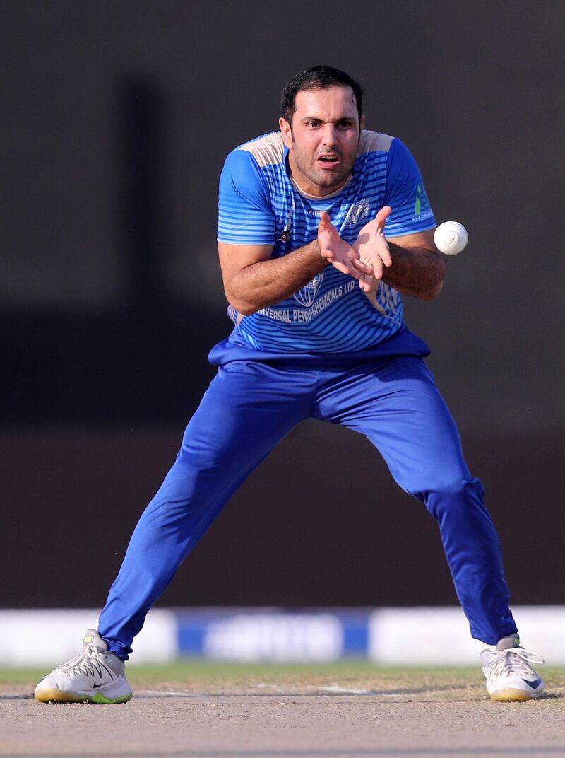 Sharjah, United Arab Emirates - October 18, 2018: Captain Mohammad Nabi of the Balkh Legends gathers the ball during the game between Kandahar Knights and Balkh Legends in the Afghanistan Premier League. Thursday, October 18th, 2018 at Sharjah Cricket Stadium, Sharjah. Chris Whiteoak / The National