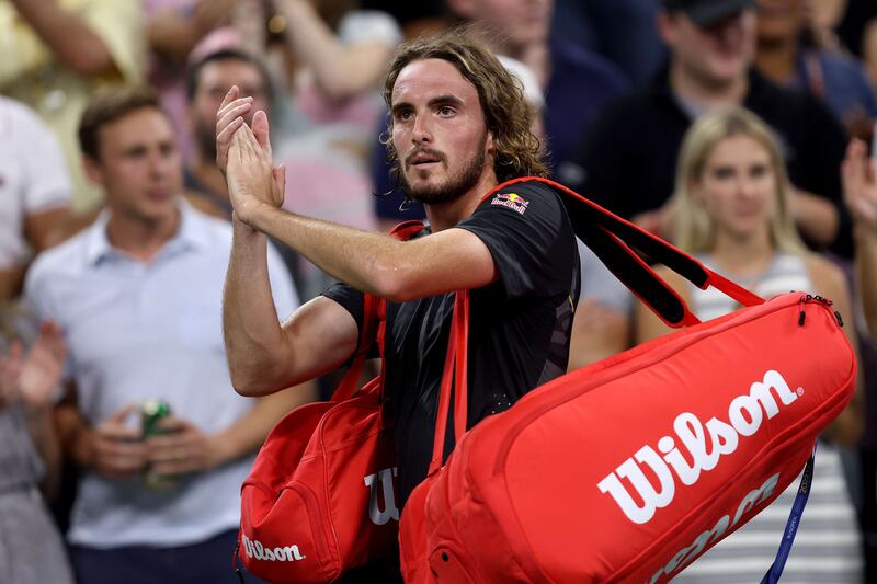 Stefanos Tsitsipas applauds the crowd after being defeated by Daniel Galan in the first round of the US Open. Getty