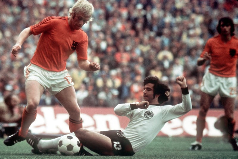 Gerd Muller fights for the ball with Wim Rijsbergen of the Netherlands in the 1974 World Cup final.