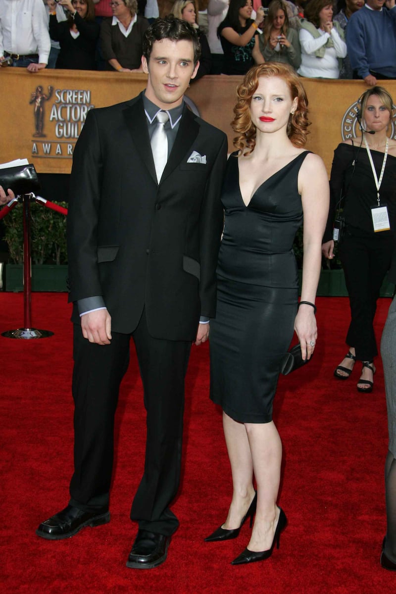 Michael Urie and Jessica Chastain, in a black cocktail dress, attend the Screen Actors Guild Awards on January 28, 2007. WireImage