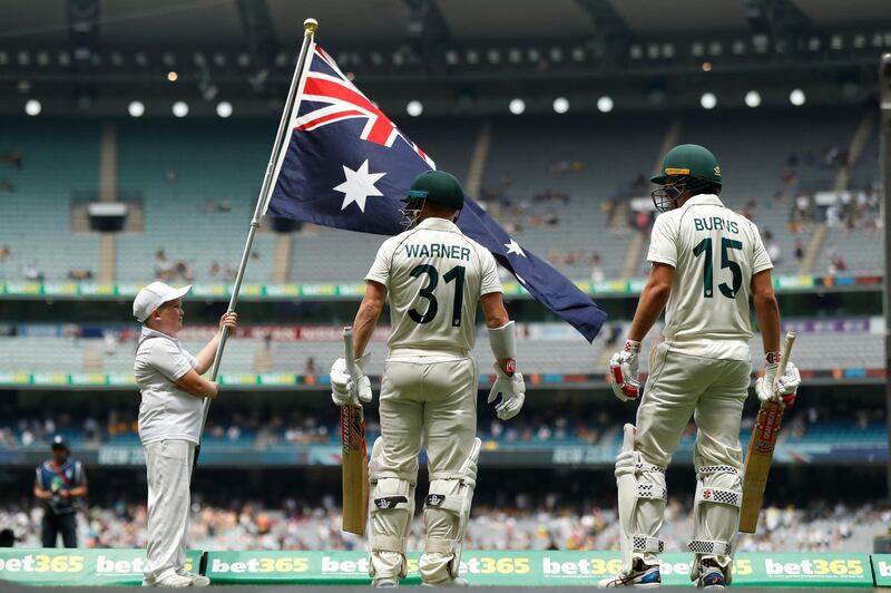 MELBOURNE, AUSTRALIA - DECEMBER 28: David Warner and Joe Burns of Australia walk out to bat in the second innings during day three of the Second Test match in the series between Australia and New Zealand at Melbourne Cricket Ground on December 28, 2019 in Melbourne, Australia. (Photo by Darrian Traynor/Getty Images)