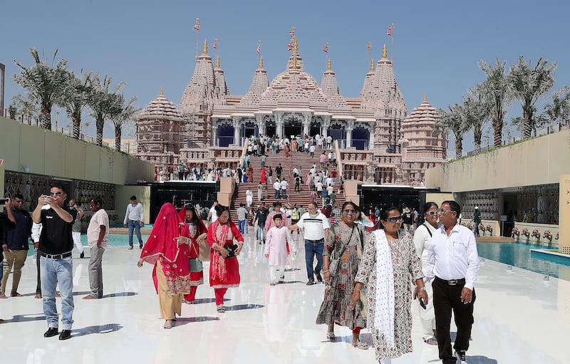 The Baps Hindu Mandir in Abu Dhabi welcomes thousands of visitors each day. Pawan Singh / The National