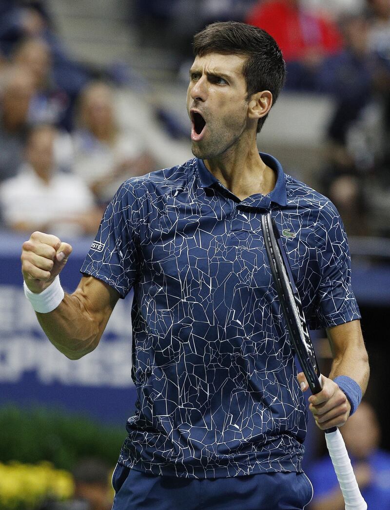 Novak Djokovic of Serbia reacts as he plays Juan Martin del Potro of Argentina.  EPA