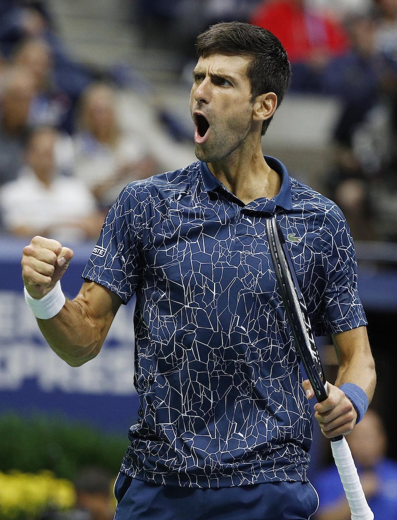 Novak Djokovic of Serbia reacts as he plays Juan Martin del Potro of Argentina.  EPA