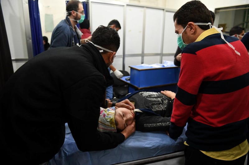 A woman lies on a stretcher inside a hospital after what the Syrian state media said was a suspected toxic gas attack in Aleppo, Syria November 24, 2018. Picture taken November 24, 2018. SANA/Handout via REUTERS ATTENTION EDITORS - THIS IMAGE WAS PROVIDED BY A THIRD PARTY. REUTERS IS UNABLE TO INDEPENDENTLY VERIFY THIS IMAGE      TPX IMAGES OF THE DAY