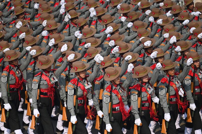 Indian soldiers march in rehearsal for the Republic Day parade, in New Delhi. AFP