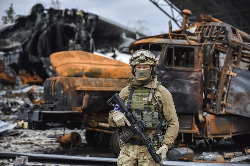 A Ukrainian special forces officer stands at the Gostomel airfield near Kyiv. The unit has reportedly inflicted heavy losses upon Russian forces. EPA