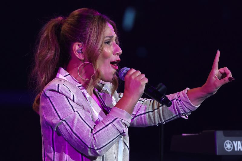 Tania Doko from Bachelor Girl performs ahead of the women’s singles final. Getty