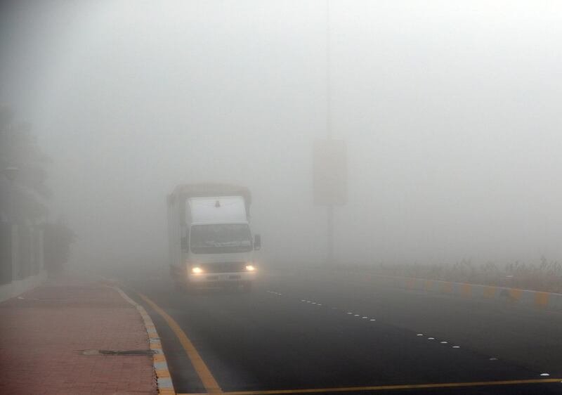 Abu Dhabi - United Arab Emirates - 22Dec2017 - Dense fog engulfed Abu Dhabi city in the morning having poor visibilty for motorist. Ravindranath K / The National