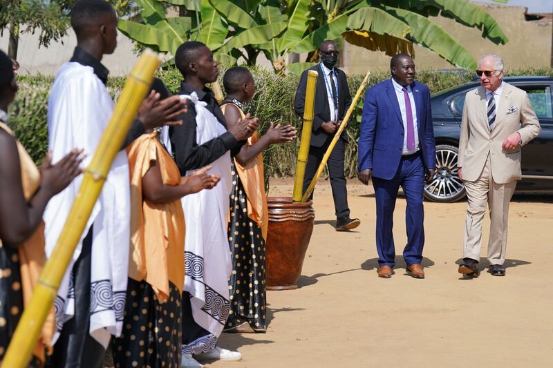 Prince Charles with Minister of Rwanda Local Government Jean-Marie Gatabazi at Mybo village. PA