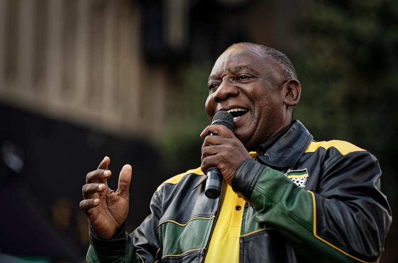 President Cyril Ramaphosa speaks at a victory rally for his African National Congress (ANC) party in downtown Johannesburg, South Africa Sunday, May 12, 2019. South Africa's president on Sunday vowed to purge his party of "bad and deviant tendencies" as he prepares to appoint a new Cabinet following a victory in national elections. (AP Photo/Ben Curtis)