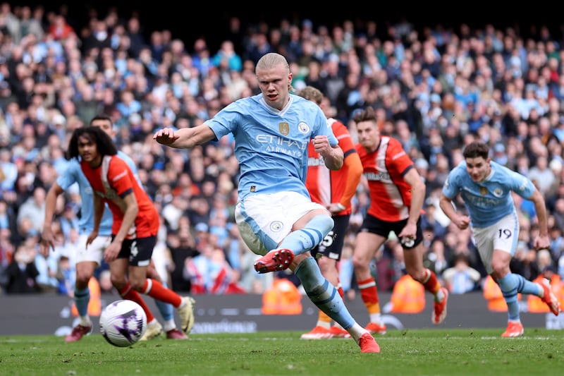 Erling Haaland of Manchester City scores his team's third goal from the penalty spot. Getty Images