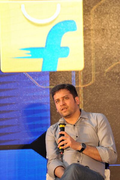 Chief Operating Officer and Co-Founder of Flipkart, Binny Bansal speaks during the launch of Flipkart's Largest Fulfillment Centre on the outskirts of Hyderabad on October 30, 2015.  Flipkart is India's leading e-commerce marketplace offering over 30 million products across 70 plus categories including Books, Media, consumer Electronics and Lifestyle.   AFP PHOTO / NOAH SEELAM (Photo by NOAH SEELAM / AFP)