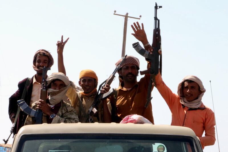 epa06383441 Armed members of Yemen's Saudi-backed forces celebrate after seizing a strategic town from the Houthi rebels in the western province of Hodeidah, Yemen, 11 December 2017. According to reports, Yemeni army forces and the Popular Resistance militiamen, with the air support by the Saudi-led military coalition, have made rapid advances in recent days in Hodeidah province, on Yemen's Red Sea coast, beginning with the capture of Al-Khokha following fierce battles with the Houthis.  EPA/STRINGER