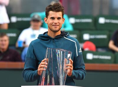 Mar 17, 2019; Indian Wells, CA, USA; Dominic Thiem (AUT) holds the championship trophy after defeating Roger Federer (not pictured) in the finals of the BNP Paribas Open at the Indian Wells Tennis Garden. Mandatory Credit: Jayne Kamin-Oncea-USA TODAY Sports