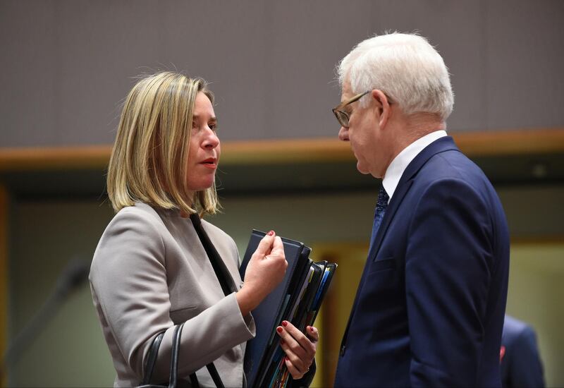 High Representative of the European Union for Foreign Affairs and Security Policy Federica Mogherini (L) talks with Polish Foreign Minister Jacek Czaputowicz (R) during a meeting at the EU headquarters in Brussels on January 21, 2019. / AFP / LOIC VENANCE
