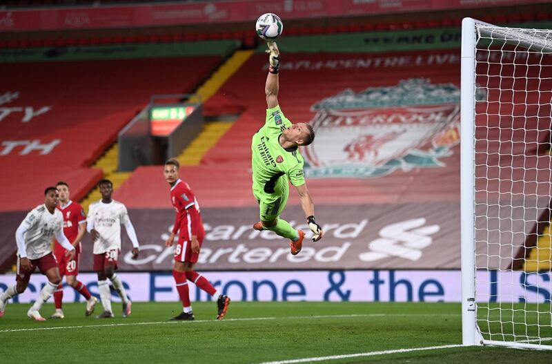 epa08714043 Arsenal's goalkeeper Bernd Leno (R) in action during the English Carabao Cup 4th round soccer match between Liverpool FC and Arsenal FC in Liverpool, Britain, 01 October 2020.  EPA/Laurence Griffiths / POOL EDITORIAL USE ONLY. No use with unauthorized audio, video, data, fixture lists, club/league logos or 'live' services. Online in-match use limited to 120 images, no video emulation. No use in betting, games or single club/league/player publications.