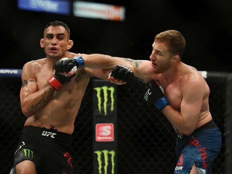 Justin Gaethje lands a blow on Tony Ferguson during their fight at UFC 249. Reuters