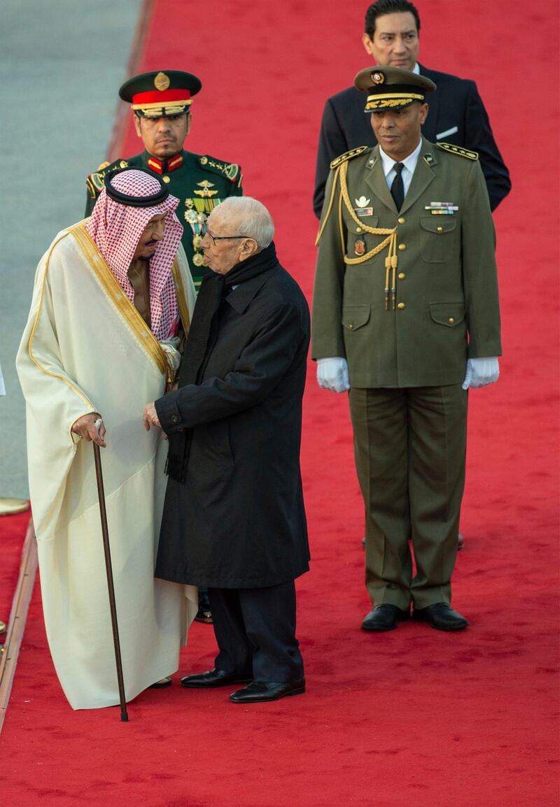 King Salman is welcomed by President Essebsi upon his arrival. EPA