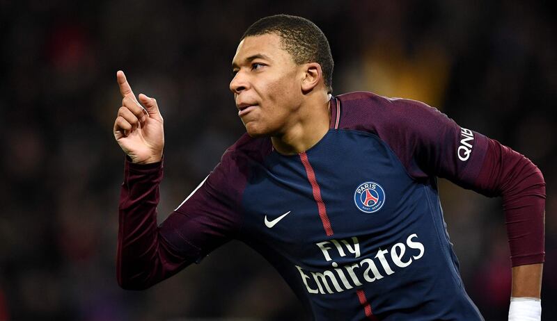 Paris Saint-Germain's French forward Kylian MBappe celebrates his last second goal during the French L1 football match between Paris Saint-Germain and Lille at the Parc des Princes stadium in Paris on December 9, 2017.   / AFP PHOTO / FRANCK FIFE