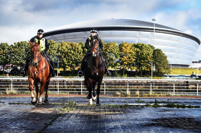 Police Scotland mounted officers patrol near the SSE Hydro venue in Glasgow. As part of the summit, world leaders are holding talks on November 1 and 2. Prime Minister Boris Johnson will represent Britain and US President Joe Biden will be there. AFP