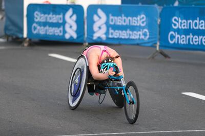 DUBAI, UNITED ARAB EMIRATES - Jan 26, 2018. 

An athlete arrives at the finish line of Standard Chartered Dubai Marathon Wheelchair race. 

(Photo by Reem Mohammed/The National)

Reporter: Amith
Section: NA + SP