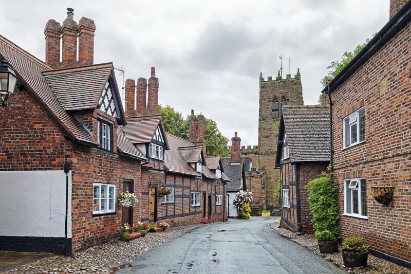 16th century grade 11 listed homes in the main street of the village of great budworth in cheshire, England. (Photo by: Kevin Britland/Education Images/Universal Images Group via Getty Images)