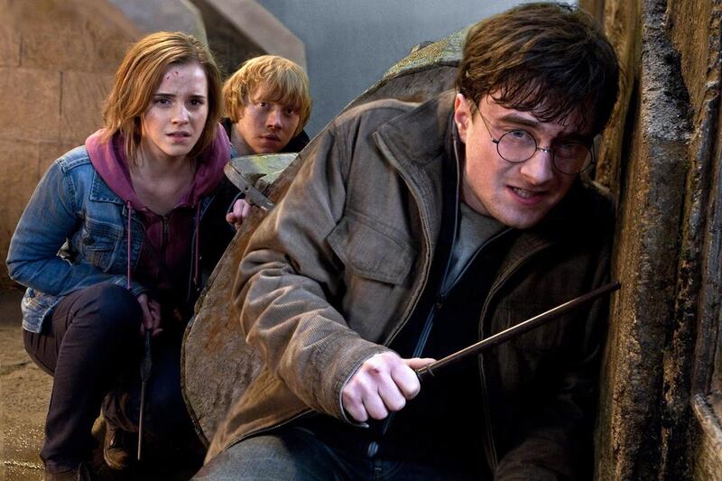 From left, Emma Watson, Rupert Grint and Daniel Radcliffe are shown in a scene from Harry Potter and the Deathly Hallows: Part 2. AP Photo/Warner Bros/Jaap Buitendijk