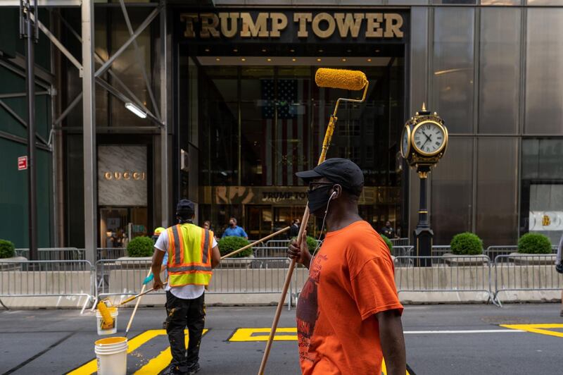 Crews begin painting a Black Lives Matter mural on Fifth Avenue directly in front of Trump Tower. Getty Images/AFP