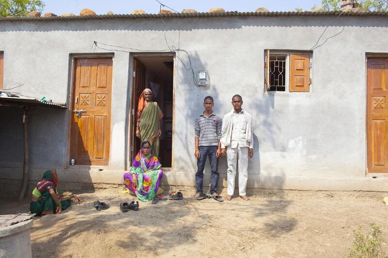 The family of Indian farmer Mahakant Mali, 55, who committed suicide in April 2016 by hanging himself from a dried Mango tree. Subhash Sharma for The National