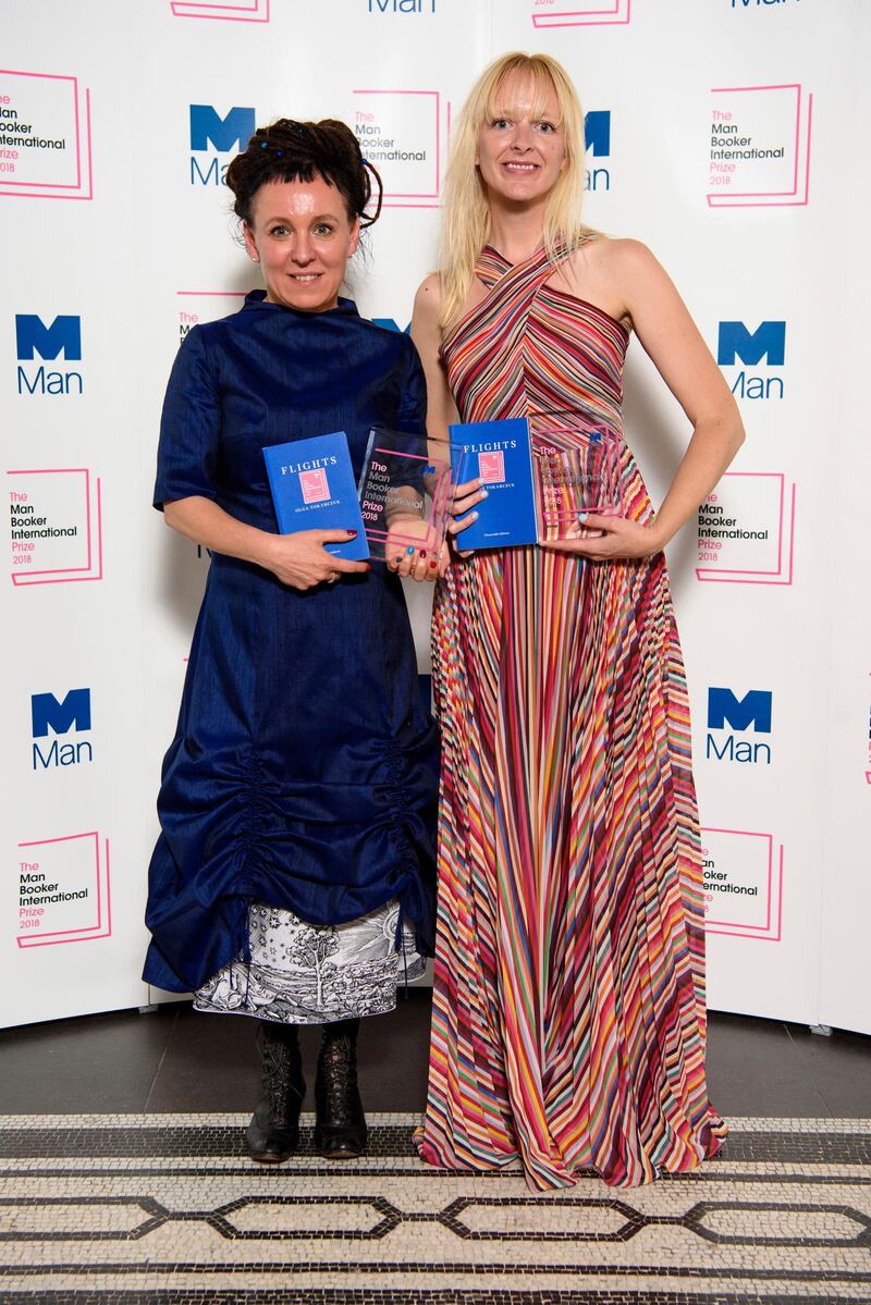 Polish author Olga Tokarczuk, left, stands with translator Jennifer Croft after winning the Man Booker International prize 2018, for her book Flights, at the Victoria and Albert Museum Tuesday, May 22, 2018 in London. (Matt Crossick//PA via AP)