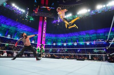 Logan Paul flies through the air towards Roman Reigns during the main event of Crown Jewel in Riyadh. Photo: WWE